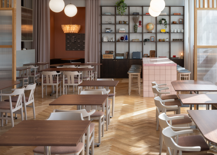 Bild av ljust restauranhitrymme med rosa färgskala och stolar och bord